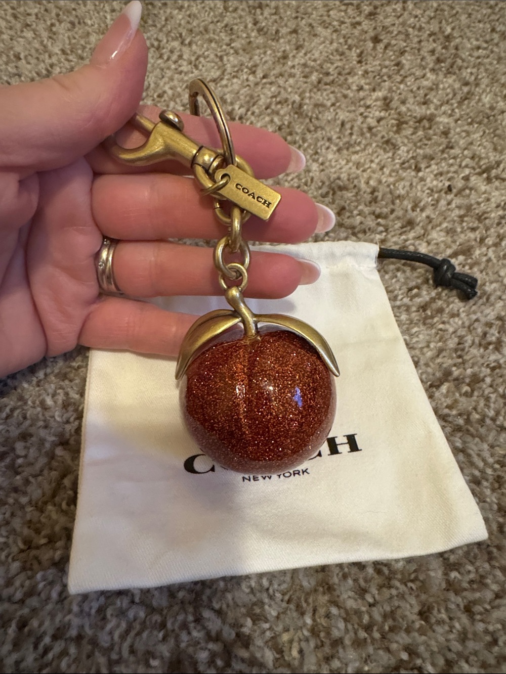 COACH PEACH BAG CHARM